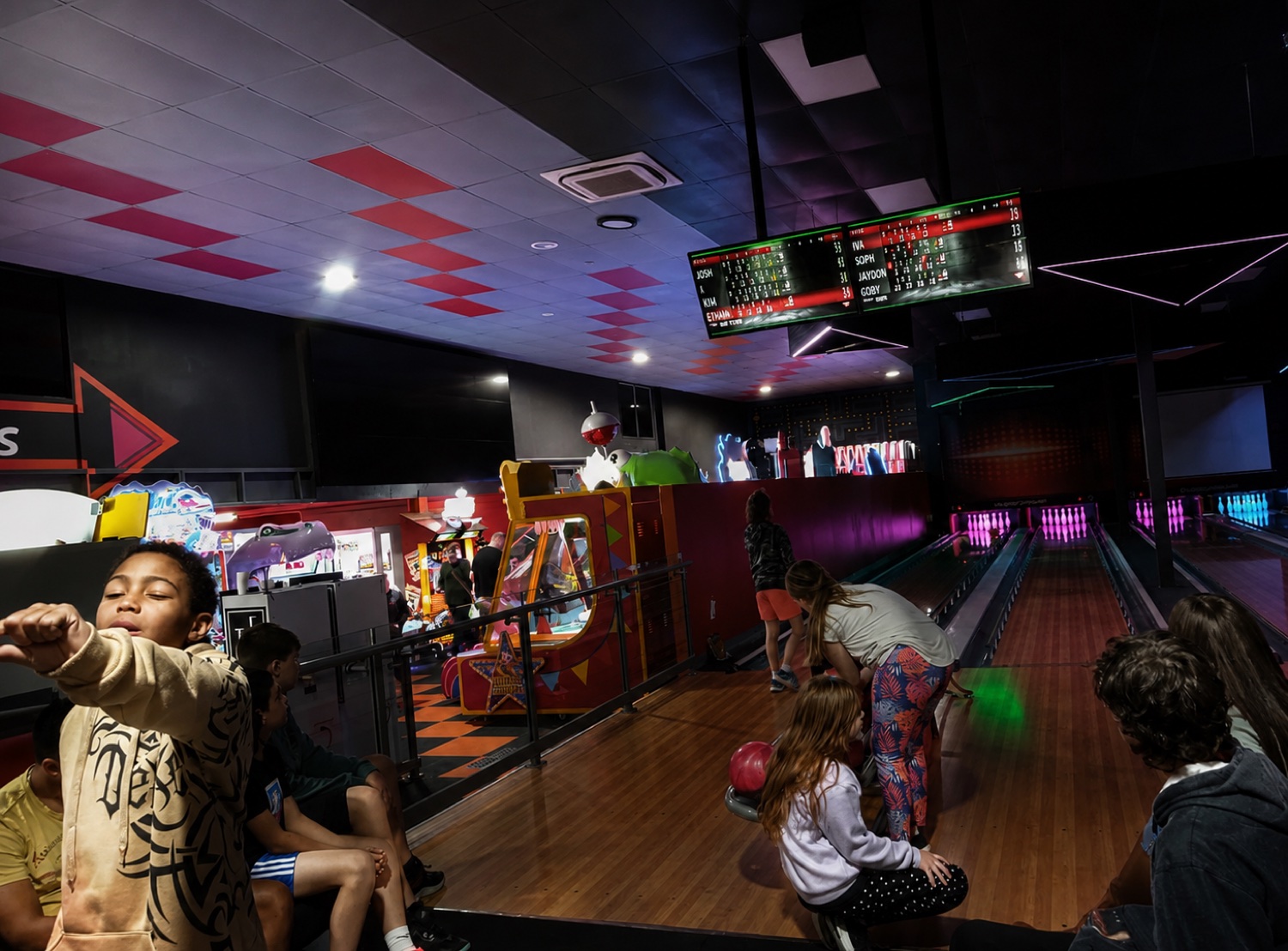 Kids bowling on a respite weekend excursion